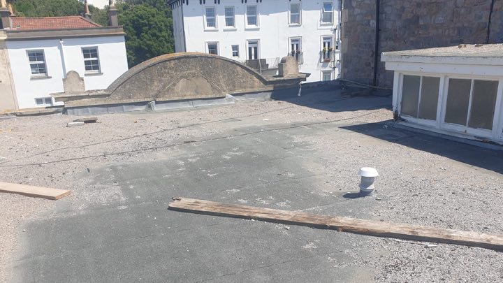 Flat roof before Hunt's Roofing work