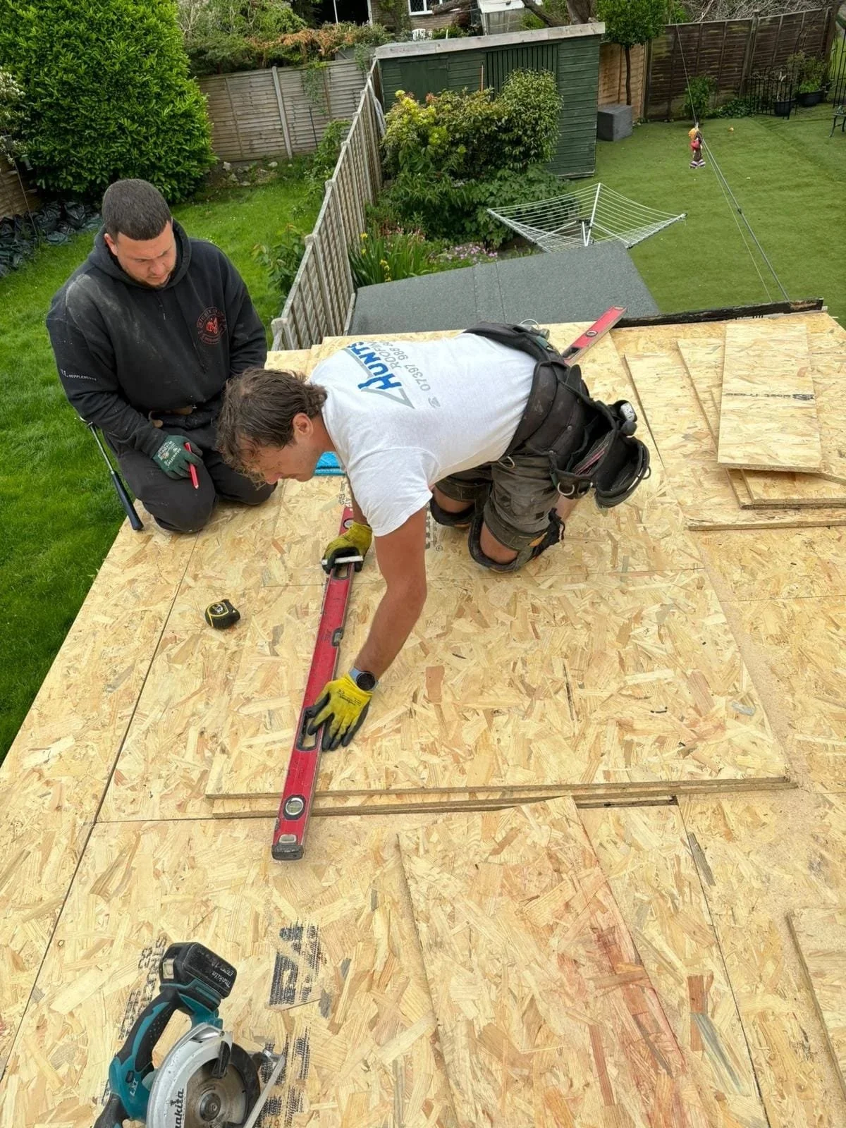 Lewis Hunt working on a roof in Weston-super-Mare
