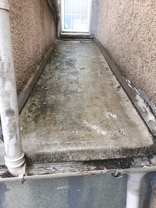 Small flat roof before Hunt's Roofing work
